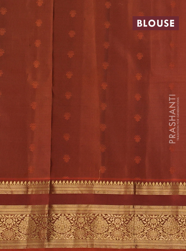 Pure soft silk saree bottle green and rustic orange with allover zari woven buttas and zari woven border
