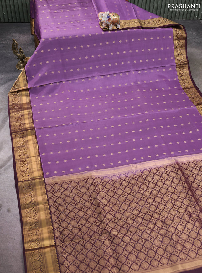 Pure soft silk saree pastel purple and wine shade with allover zari woven buttas and floral zari woven border