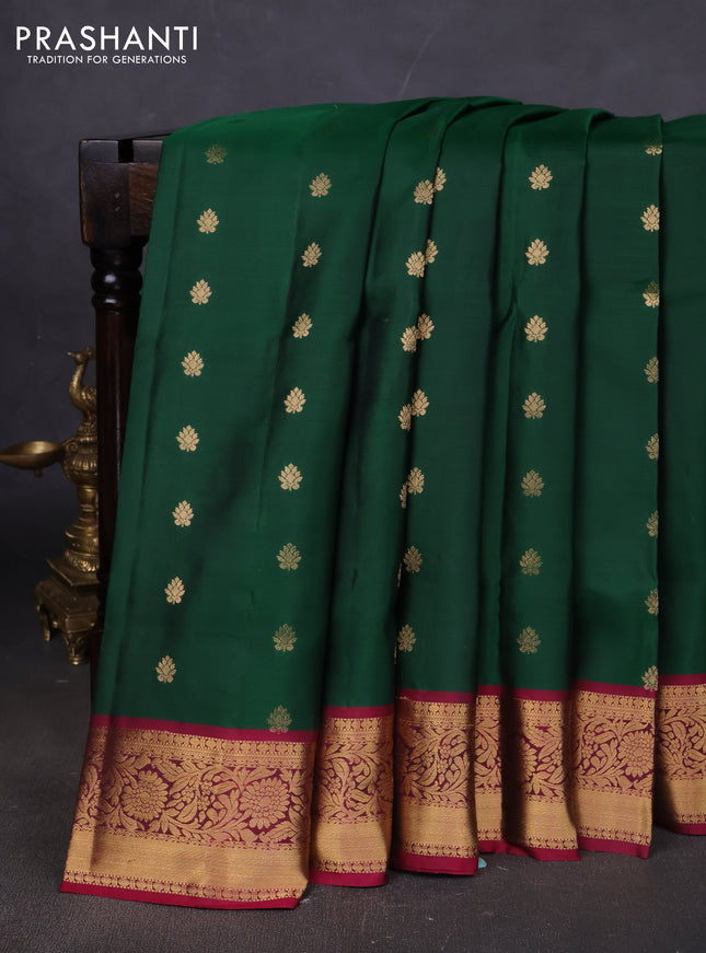 Pure soft silk saree dark green and dark magenta pink with allover zari woven buttas and floral zari woven border