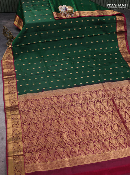 Pure soft silk saree dark green and dark magenta pink with allover zari woven buttas and floral zari woven border
