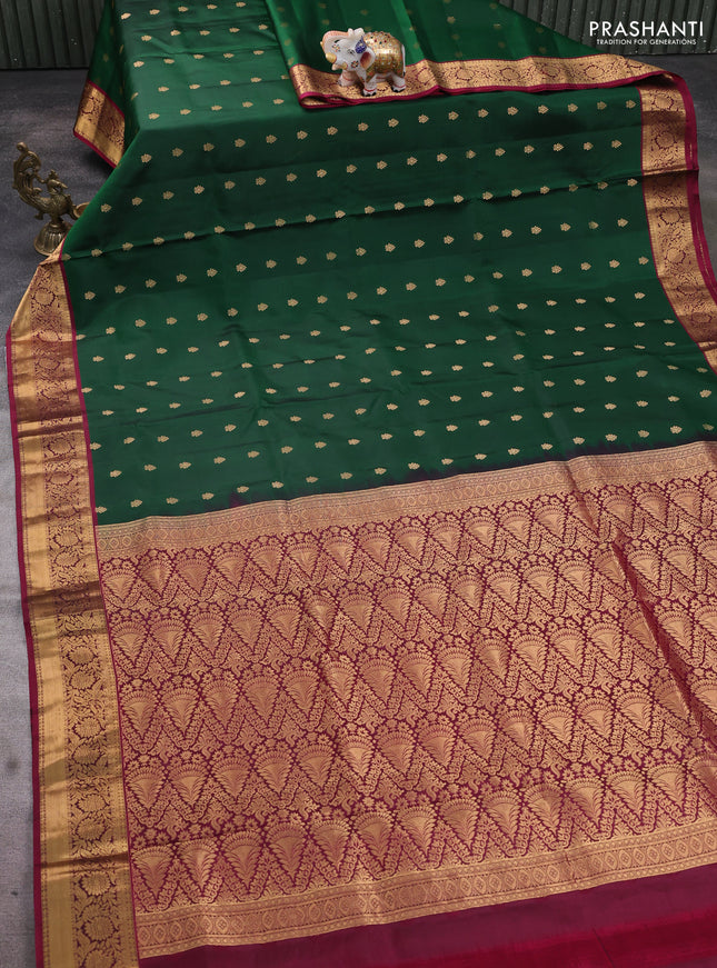 Pure soft silk saree dark green and dark magenta pink with allover zari woven buttas and floral zari woven border