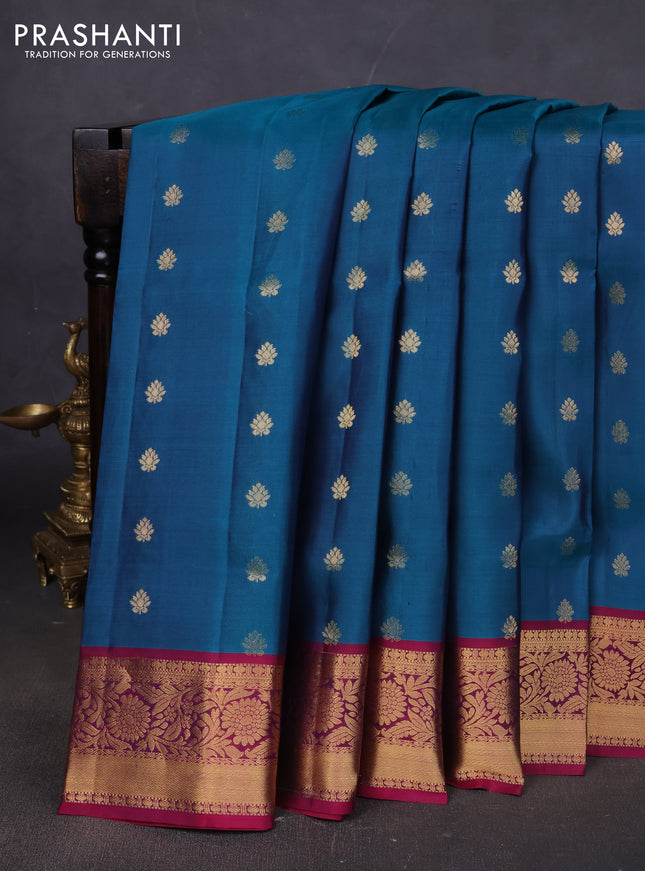 Pure soft silk saree peacock blue and dark magenta pink with allover zari woven buttas and floral zari woven border