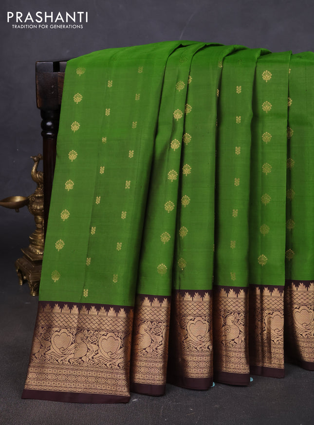 Pure soft silk saree mehendi green and coffee brown with allover zari woven buttas and annam zari woven border
