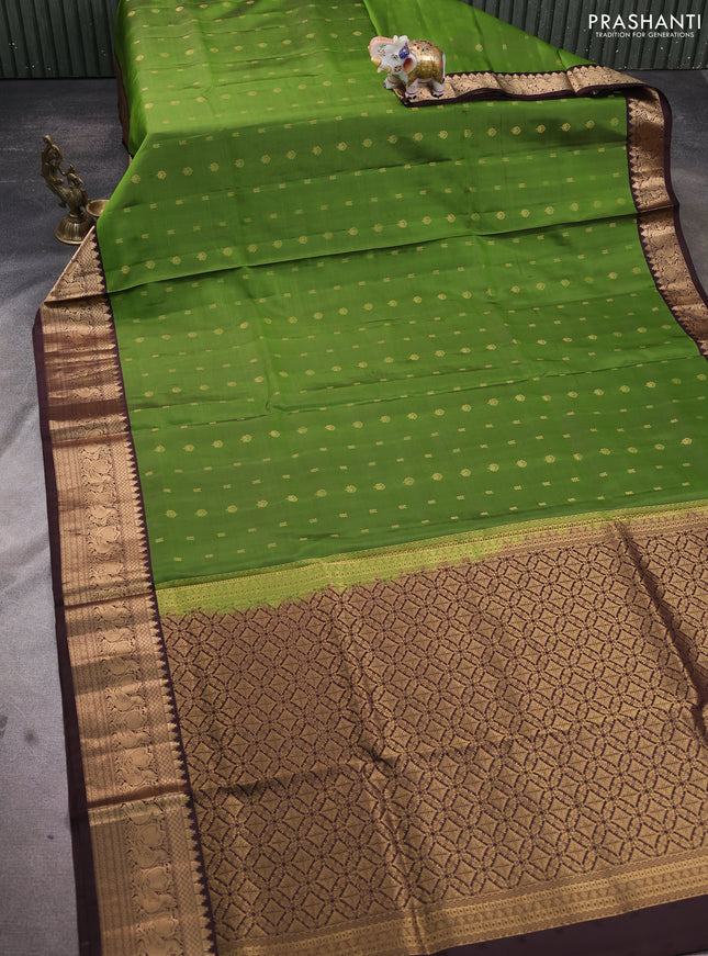 Pure soft silk saree mehendi green and coffee brown with allover zari woven buttas and annam zari woven border