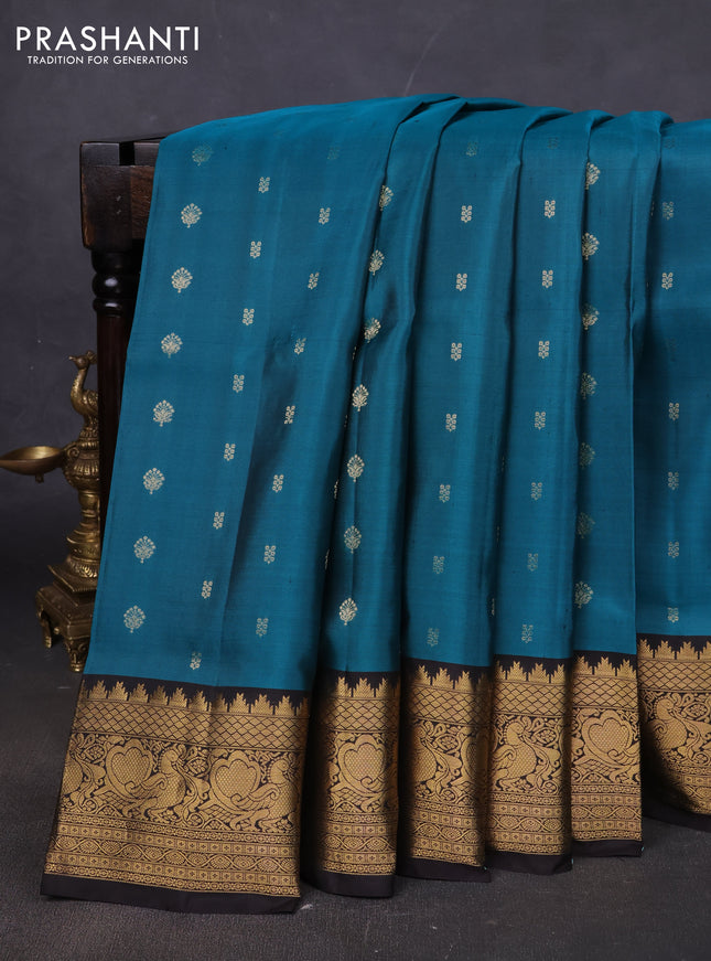 Pure soft silk saree peacock green and coffee brown with allover zari woven buttas and annam zari woven border