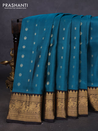 Pure soft silk saree peacock green and coffee brown with allover zari woven buttas and annam zari woven border