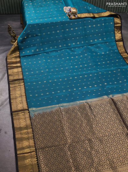 Pure soft silk saree peacock green and coffee brown with allover zari woven buttas and annam zari woven border