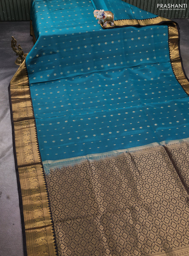 Pure soft silk saree peacock green and coffee brown with allover zari woven buttas and annam zari woven border