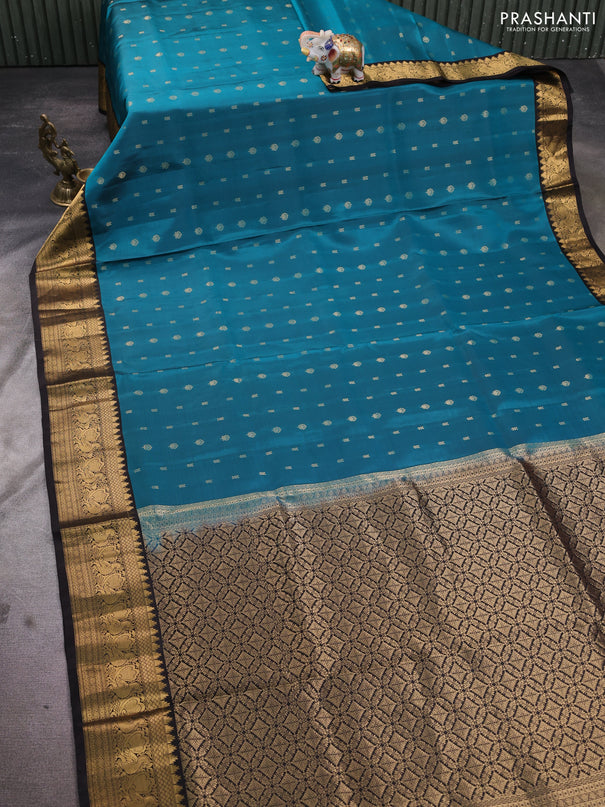 Pure soft silk saree peacock green and coffee brown with allover zari woven buttas and annam zari woven border