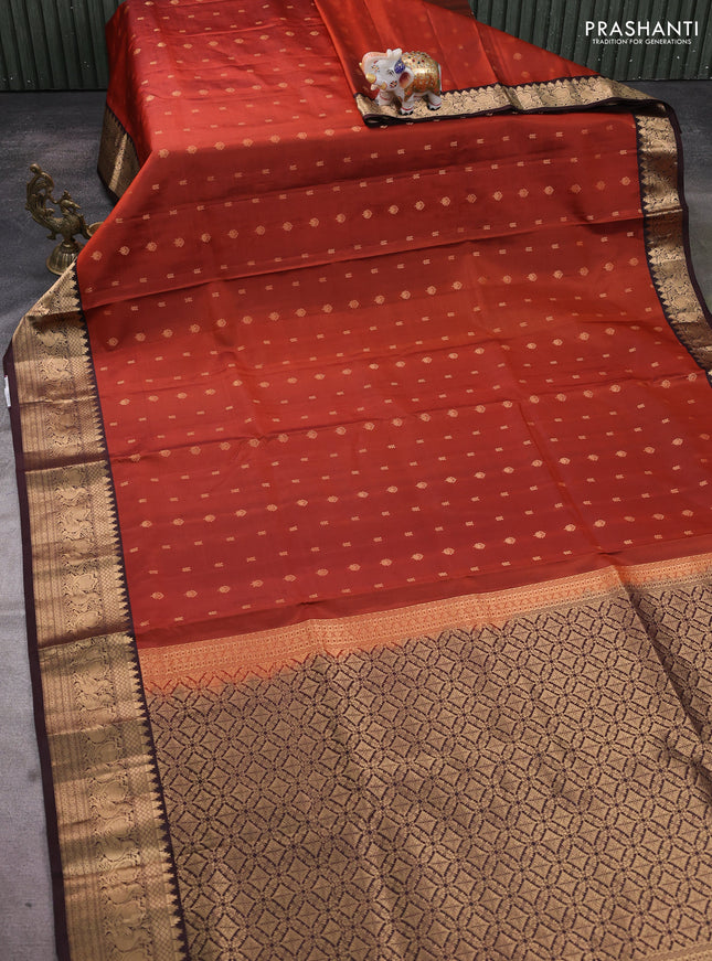 Pure soft silk saree rustic orange and coffee brown with allover zari woven buttas and annam zari woven border