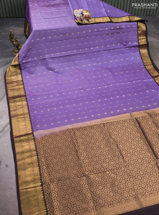 Pure soft silk saree pastel violet and coffee brown with allover zari woven buttas and annam zari woven border