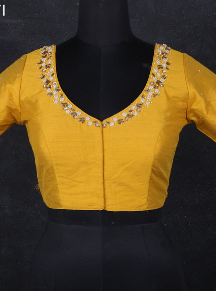 Raw silk readymade blouse yellow with beaded work and back knot