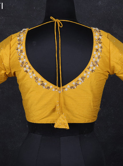 Raw silk readymade blouse yellow with beaded work and back knot