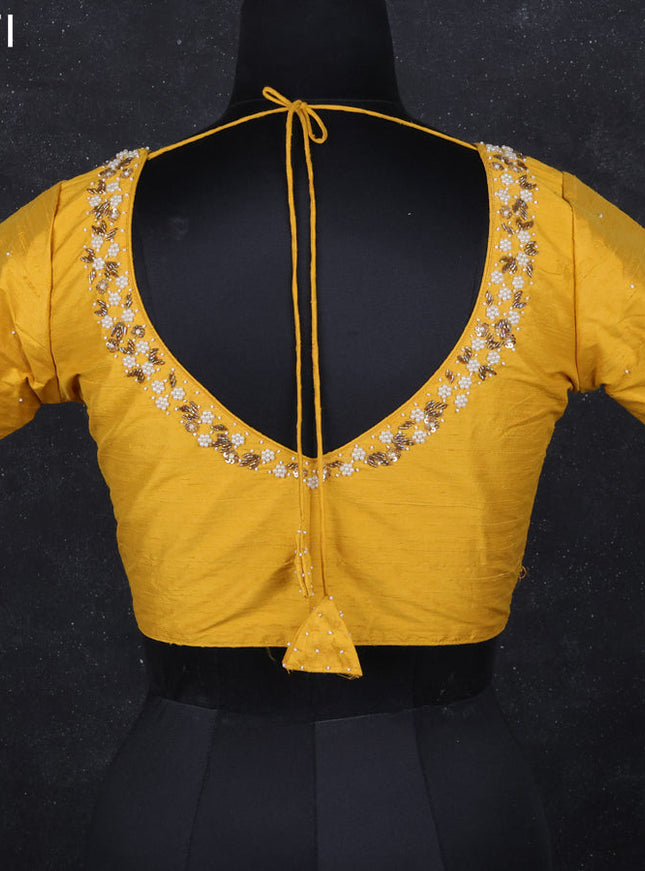Raw silk readymade blouse yellow with beaded work and back knot