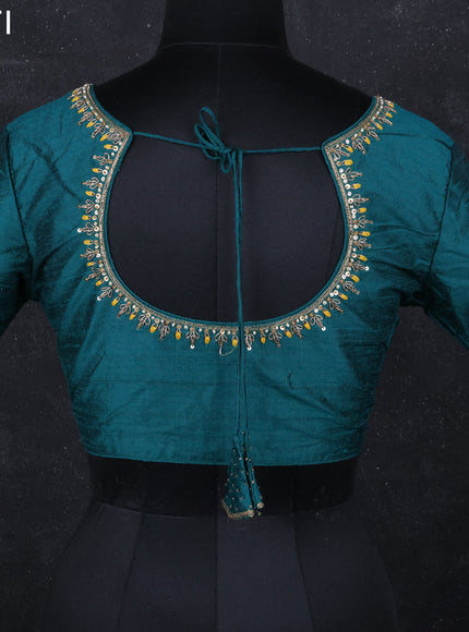 Raw silk readymade blouse peacock green with aari work and back knot