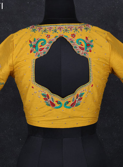 Raw silk readymade blouse yellow with aari work