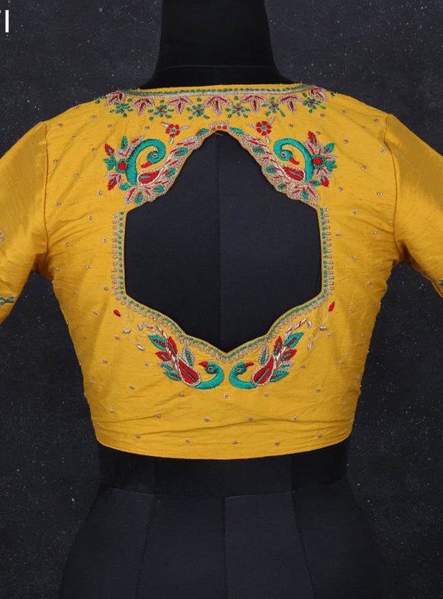 Raw silk readymade blouse yellow with aari work