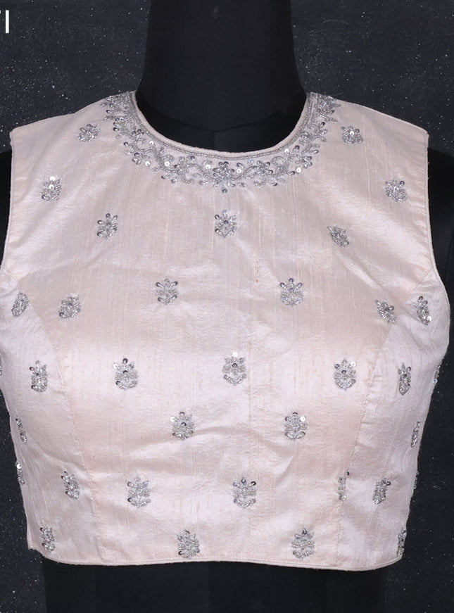 Raw silk readymade blouse pastel peach shade with aari work without sleeve