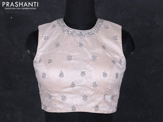 Raw silk readymade blouse pastel peach shade with aari work without sleeve