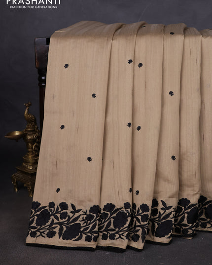 Art tussar saree beige and black with embroidery work and floral embroidery border