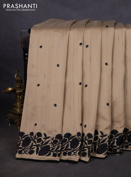 Art tussar saree beige and black with embroidery work and floral embroidery border