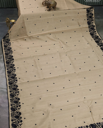 Art tussar saree beige and black with embroidery work and floral embroidery border