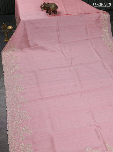 Art tussar saree peach shade with plain body and floral embroidery border