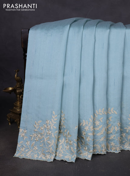 Art tussar saree patel blue with plain body and floral embroidery border