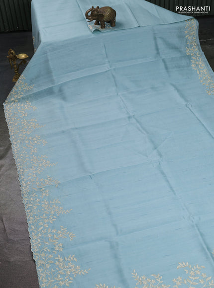 Art tussar saree patel blue with plain body and floral embroidery border
