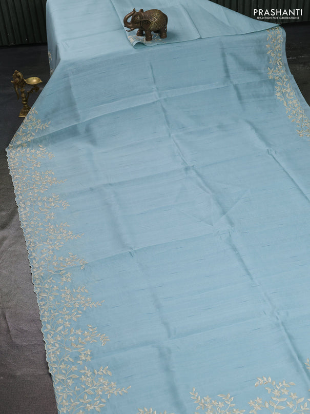 Art tussar saree patel blue with plain body and floral embroidery border