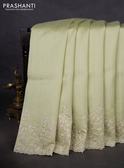 Art tussar saree mild pista green with plain body and floral embroidery border