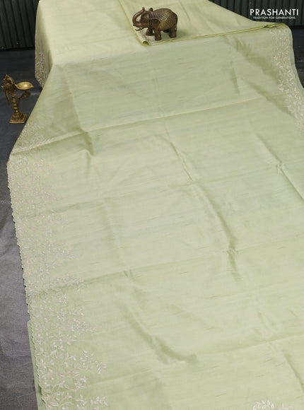 Art tussar saree mild pista green with plain body and floral embroidery border