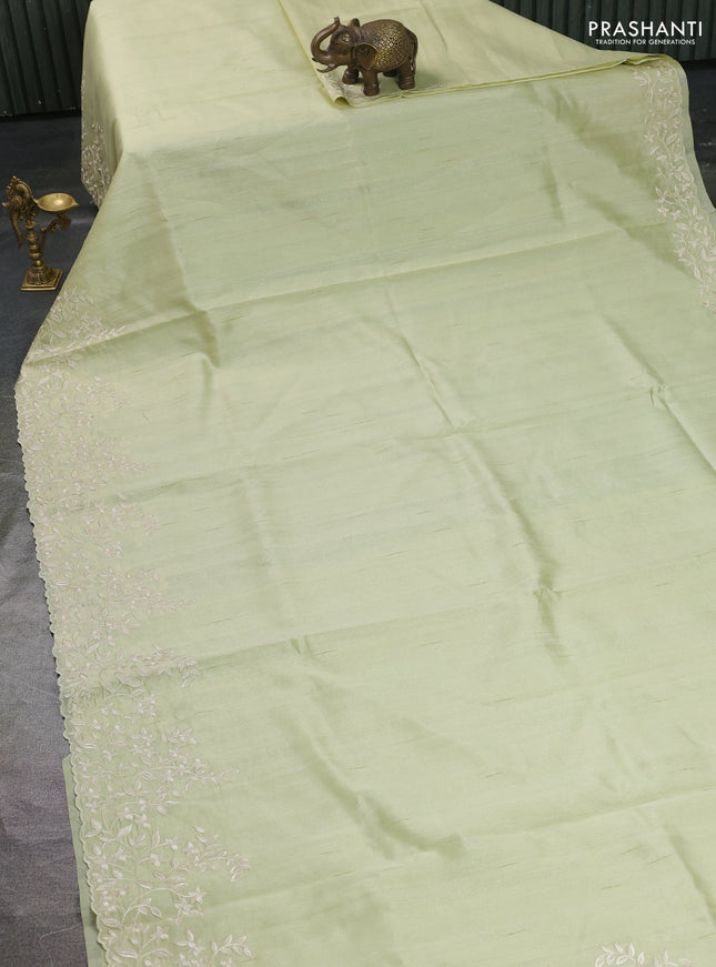 Art tussar saree mild pista green with plain body and floral embroidery border