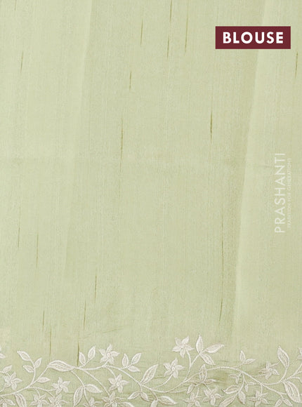 Art tussar saree mild pista green with plain body and floral embroidery border