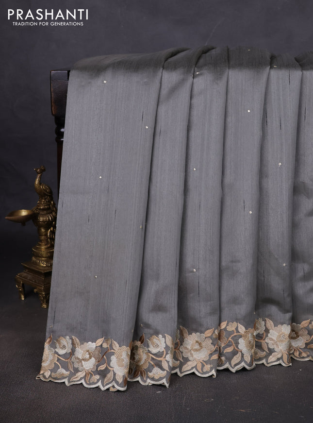Art tussar saree grey with embroidery work and floral embroidery border