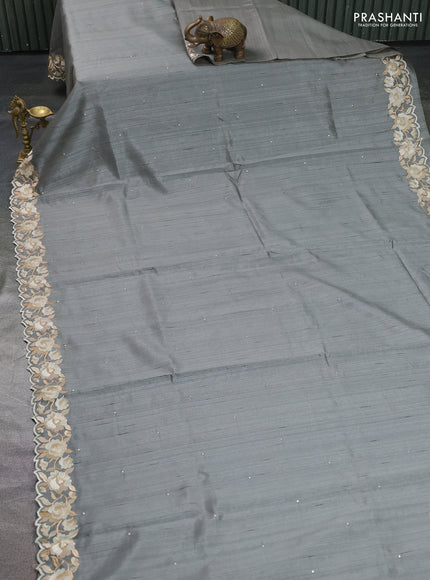 Art tussar saree grey with embroidery work and floral embroidery border
