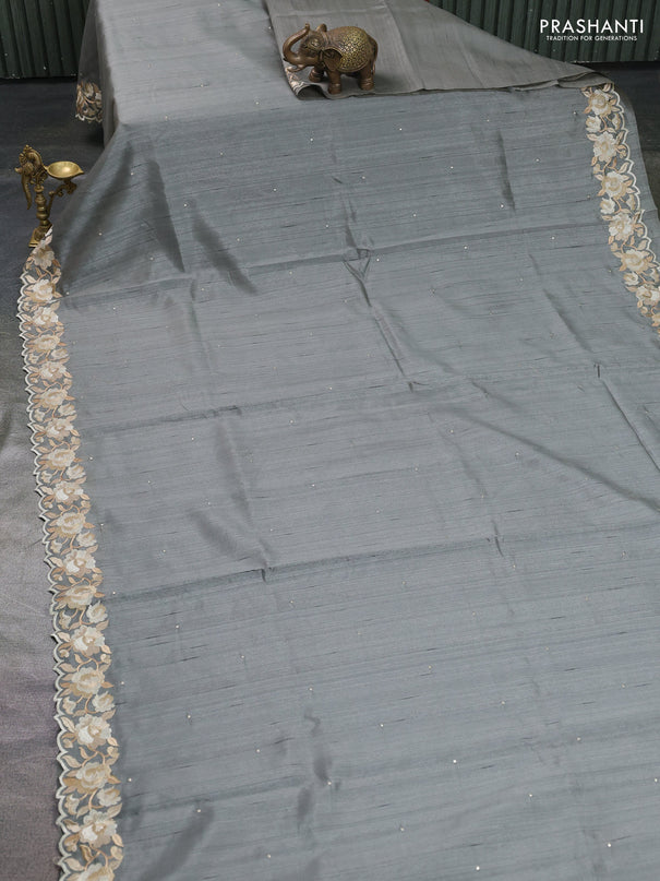 Art tussar saree grey with embroidery work and floral embroidery border
