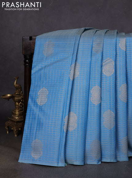 Pure kanchipuram silk saree pastel blue with allover zari checks & buttas in borderless style