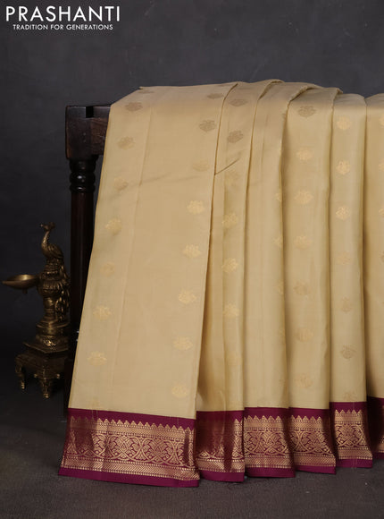 Pure kanchipuram silk saree beige and purple with zari woven buttas and zari woven korvai border
