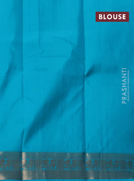 Pure kanchipuram silk saree deep wine and teal blue with floral zari woven buttas and zari woven korvai border