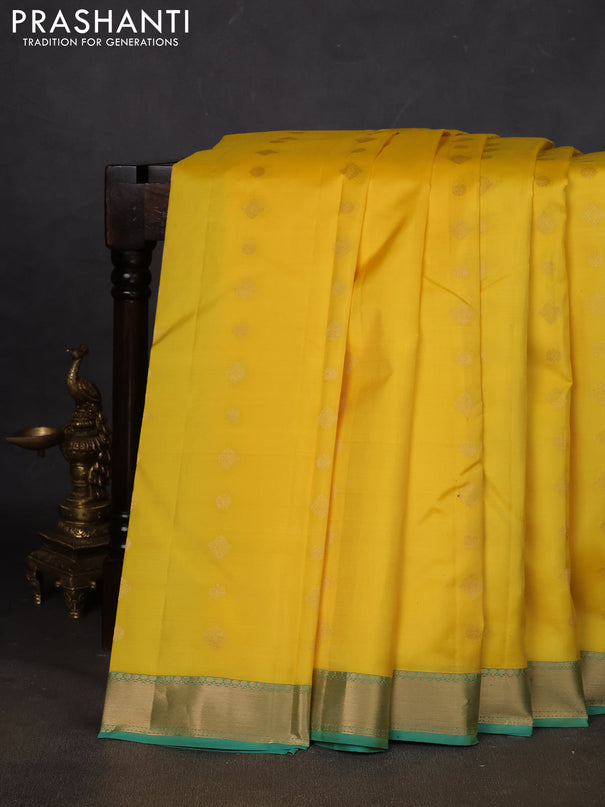 Pure kanchipuram silk saree yellow and teal blue with zari woven buttas and zari woven border