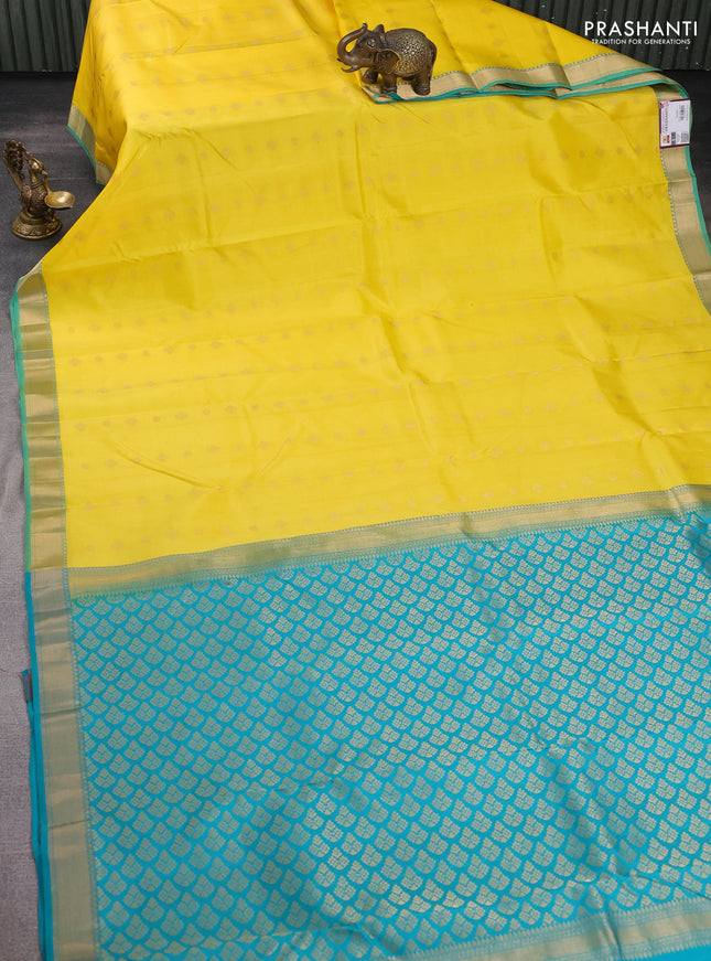 Pure kanchipuram silk saree yellow and teal blue with zari woven buttas and zari woven border