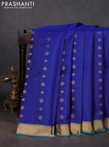 Pure kanchipuram silk saree blue and peacock green with zari woven buttas and zari woven border