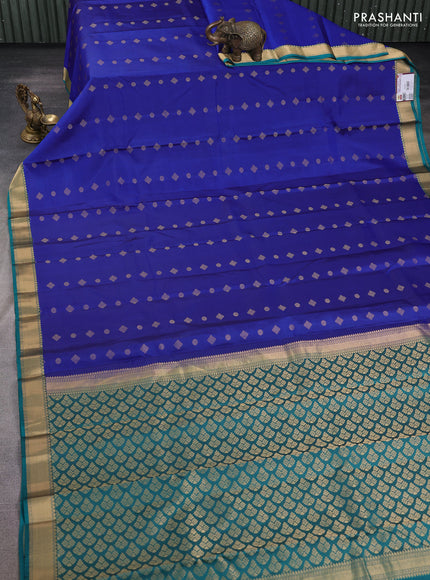Pure kanchipuram silk saree blue and peacock green with zari woven buttas and zari woven border