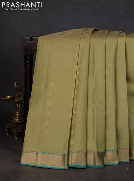 Pure kanchipuram silk saree pista green and teal blue with zari woven buttas and zari woven border