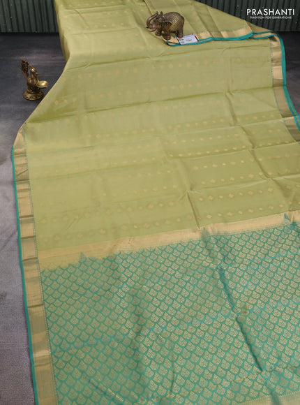 Pure kanchipuram silk saree pista green and teal blue with zari woven buttas and zari woven border