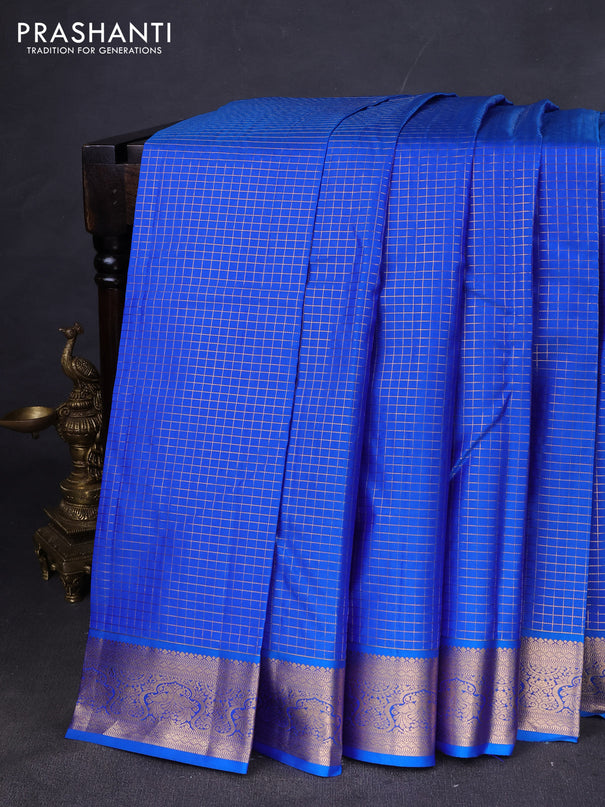 Pure kanchipuram silk saree cs blue with allover zari checked pattern and zari woven korvai border