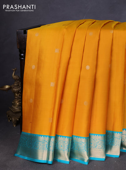 Pure kanchipuram silk saree mustard yellow and teal green with zari woven buttas and zari woven korvai border