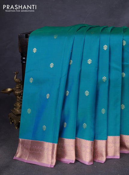 Pure kanchipuram silk saree teal blue and pastel pink with zari woven buttas and zari woven korvai border