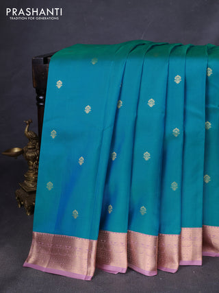 Pure kanchipuram silk saree teal blue and pastel pink with zari woven buttas and zari woven korvai border